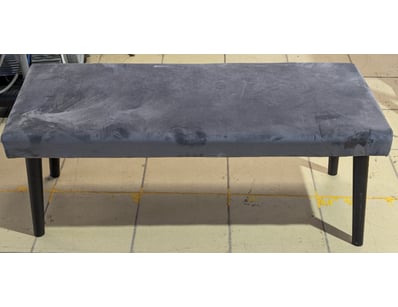 Grey upholstered bench with charcoal velvet-style ...