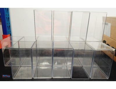 COLLECTION OF CLEAR ACRYLIC DISPLAY CASES WITH REM...