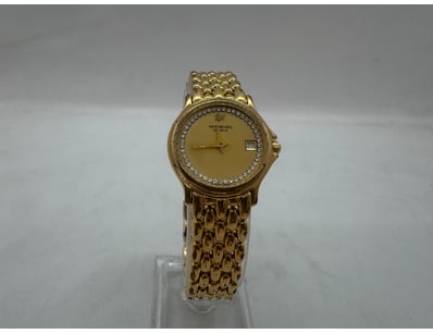 RAYMOND WEIL WATCH WITH WHITE STONES

Condition:...