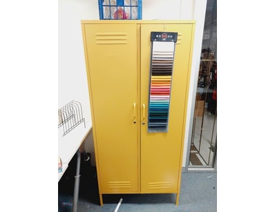 Yellow industrial metal storage cabinet with dual ...