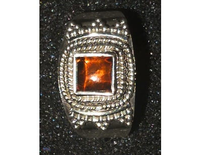 16 TCW STERLING SILVER AND AMBER RING        

 0
...