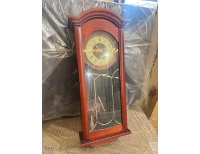 Seiko quartz wall clock featuring a traditional pe...
