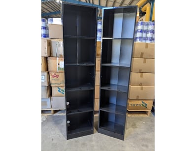 Pair of tall black display cabinets featuring modu...