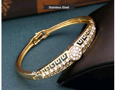 GOLD STAINLESS STEEL BRACELET WITH CUBIC ZIRCONIAS...