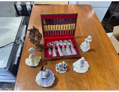 Collection of Cutlery and Porcelain Figurines

Not...