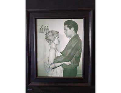 PHOTOGRAPH FEATURES ELVIS PRESLEY WITH ACTRESS TUE...