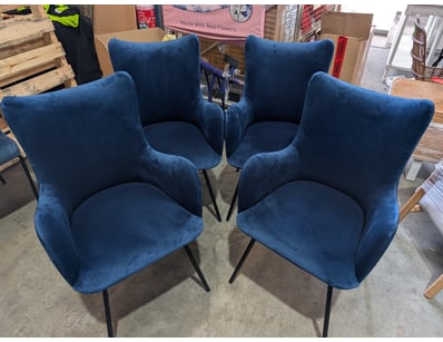Set of four  accent chairs featuring elegant curve...