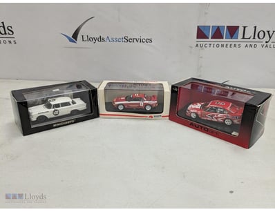 COLLECTION OF FOUR DIECAST MODEL RACING CARS

Lot ...