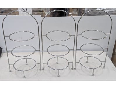 Set of three chrome-plated metal plate stands feat...