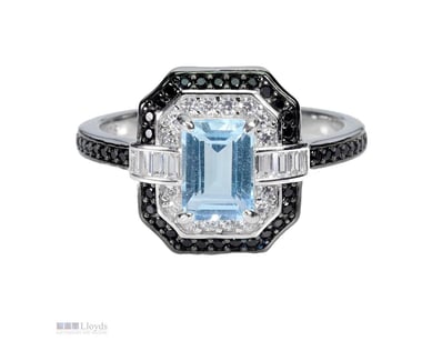 NATURAL TOPAZ & SPINEL ART DECO RING.     

Natura...