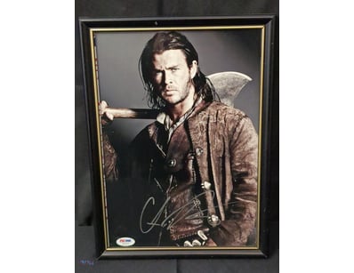 THIS FRAMED PHOTO FEATURES CHRIS HEMSWORTH AS THE ...