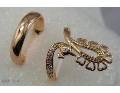 GOLD COLOUR RINGS SIZES 7        

Condition: Good...