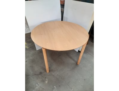 Round table, brown timber finish.

Dimensions: 7...