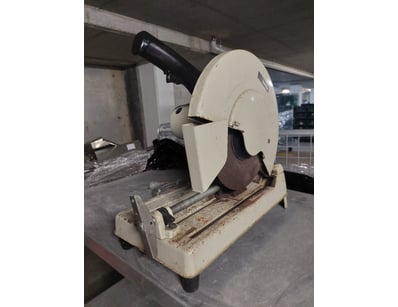 Makita 255mm chop saw in cream and black finish. F...