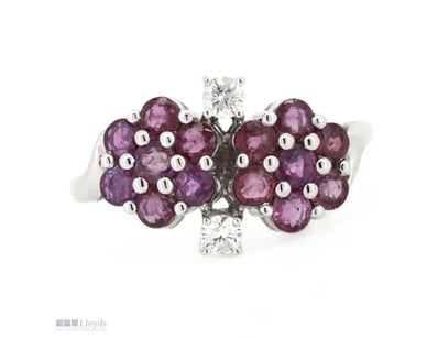 14K WHITE GOLD, RUBY AND DIAMOND, FLORAL RING.    ...
