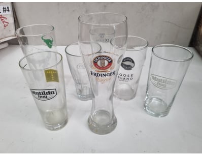 Collection of 7 vintage beer glasses featuring int...