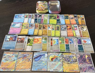 50 FOIL POKEMON CARDS INCLUDING FULL ART & EX



S...