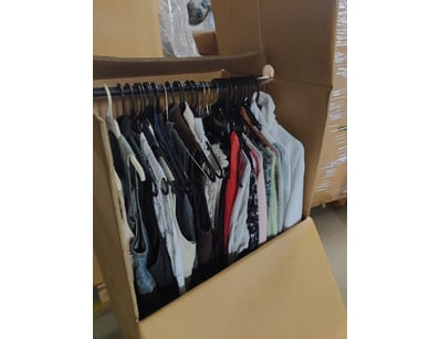 Large cardboard wardrobe box containing approximat...