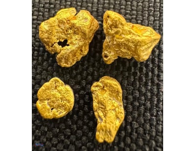 0.948 GRAMS AUSTRALIAN GOLD NUGGETS

Dimensions: H...