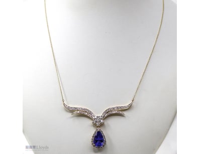 14K YELLOW GOLD, TANZANITE AND DIAMOND, NECKLACE. ...