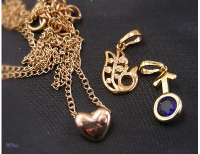 GOLD COLOUR PENDANTS        

Condition: Good - Re...