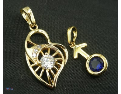 GOLD COLOUR PENDANTS       

 


 

 

Condition: ...