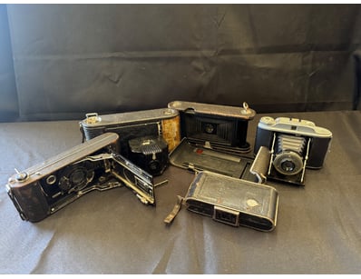 COLLECTION OF VINTAGE FOLDING CAMERAS (6 PIECES)
...