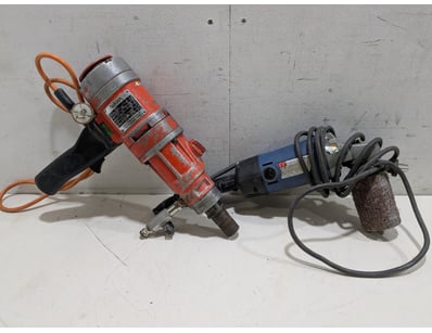 Lot comprises two electric power tools in used con...