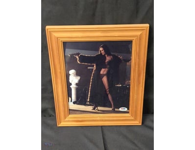 AUTOGRAPHED PHOTOGRAPH OF DEMI MOORE.

Item Size: ...