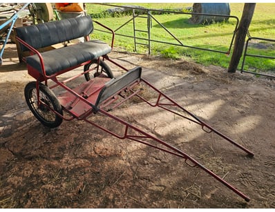 Two wheel horse drawn cart, red, metal

Sold as lo...