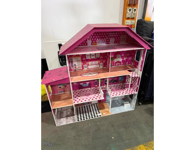 Stunning three-storey pink dollhouse featuring mul...