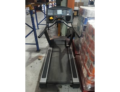 Life Fitness commercial treadmill featuring a digi...