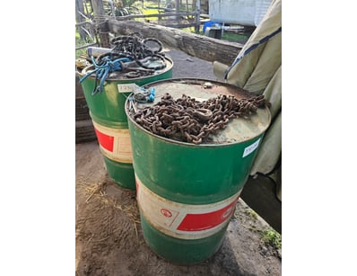 Metal barrels, green, quantity 2, and assorted too...