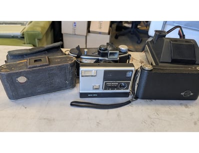 VINTAGE INSTANT AND DISC CAMERA COLLECTION - SEVEN...