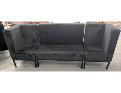 Modern three-piece modular seating set featuring a...