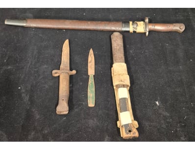 COLLECTION OF MILITARY BAYONET AND KNIVES

Colle...