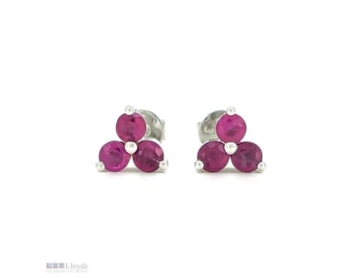 9CT WHITE GOLD CEYLON RUBY STUD EARRINGS      

Fe...