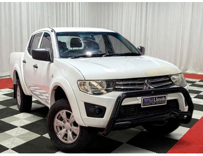 <b>2013 Mitsubishi Triton DID CommonRail - White -...