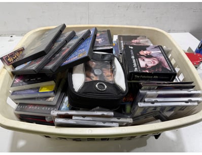 +30 Assorted CD’s & DVD’s

SOLD AS LOT

