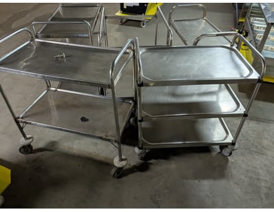 Stainless steel utility service carts featuring ro...