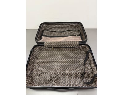 Hard-shell suitcase featuring a black exterior wit...