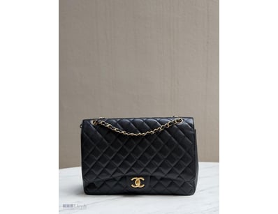 CHANEL BLACK MAXI CAVIAR DOUBLE FLAP WITH GHW

Nai...