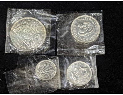 1963 FOUR PROOF COIN SET

Coins Include Florin, ...