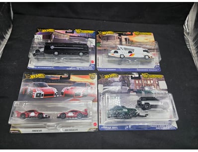 HOT WHEELS TEAM TRANSPORT COLLECTION - FOUR MULTI-...