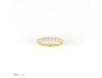 1.19 CT OVAL SHARED-PRONG BAND IN 18KT YELLOW GOLD...