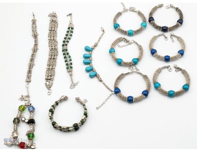 COLLECTION OF SILVER-TONE BEADED BRACELETS AND CHA...