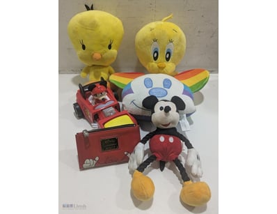 Disney collectibles lot featuring iconic character...