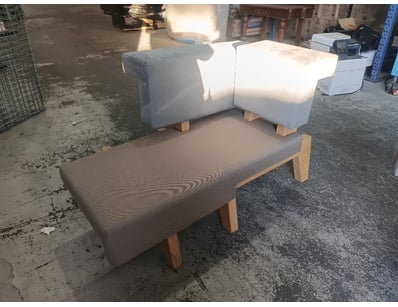 Modern modular lounge suite featuring a charcoal u...