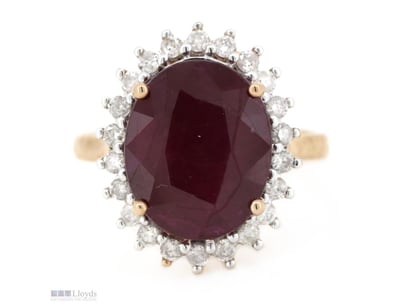 14K ROSE GOLD, RUBY AND DIAMOND, HALO RING.      
...