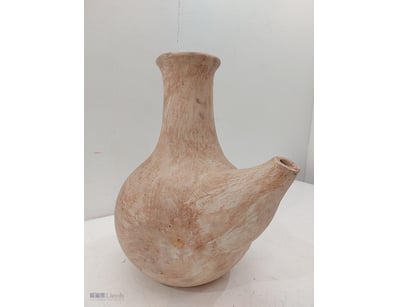 terracotta Vase featuring a bulbous reservoir body...